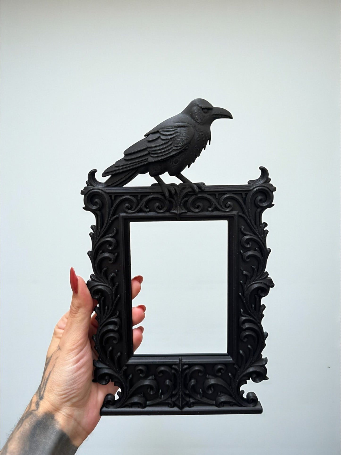 Gothic crow frame with ornate baroque detailing