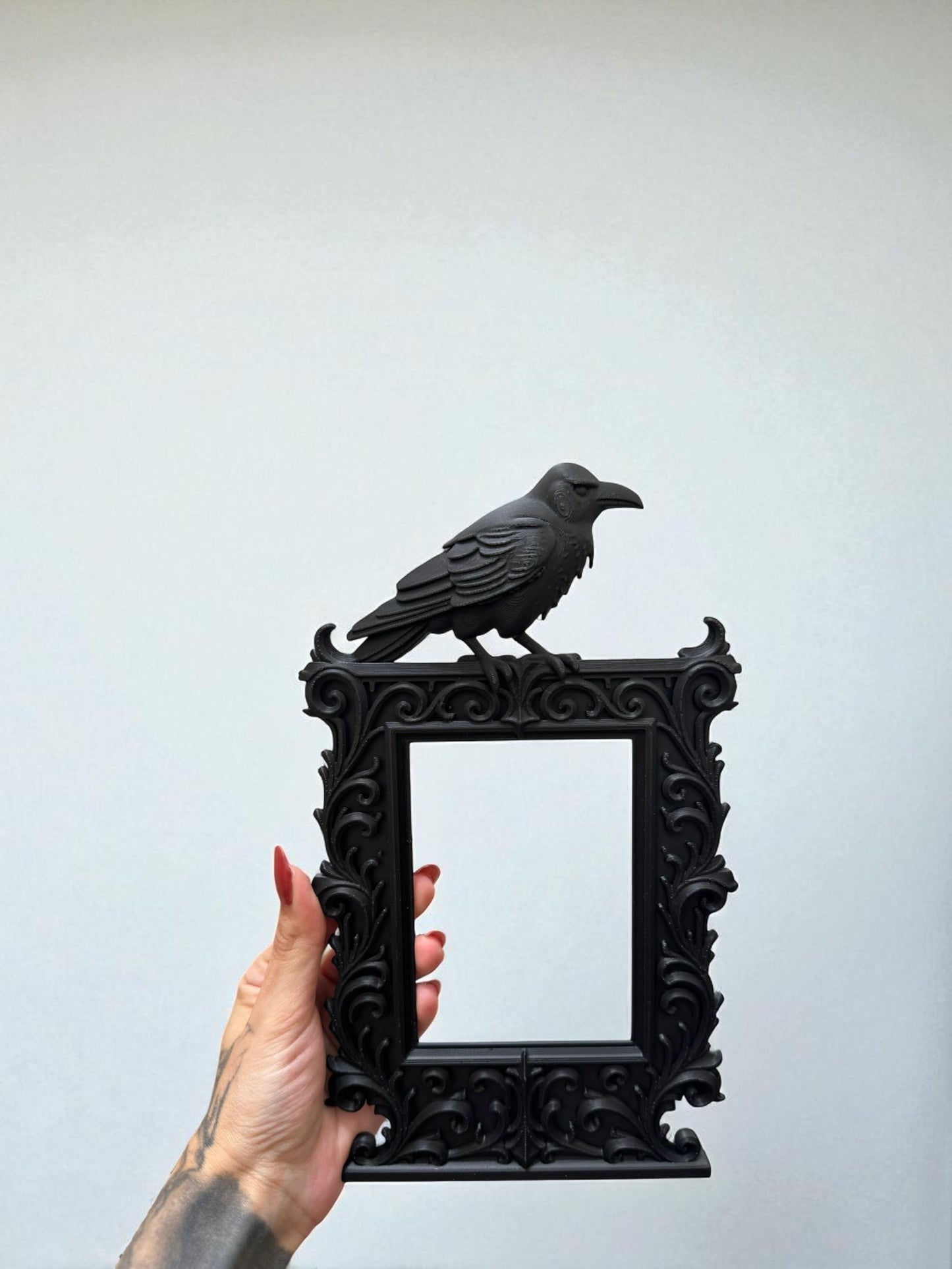 Gothic crow frame with ornate baroque detailing