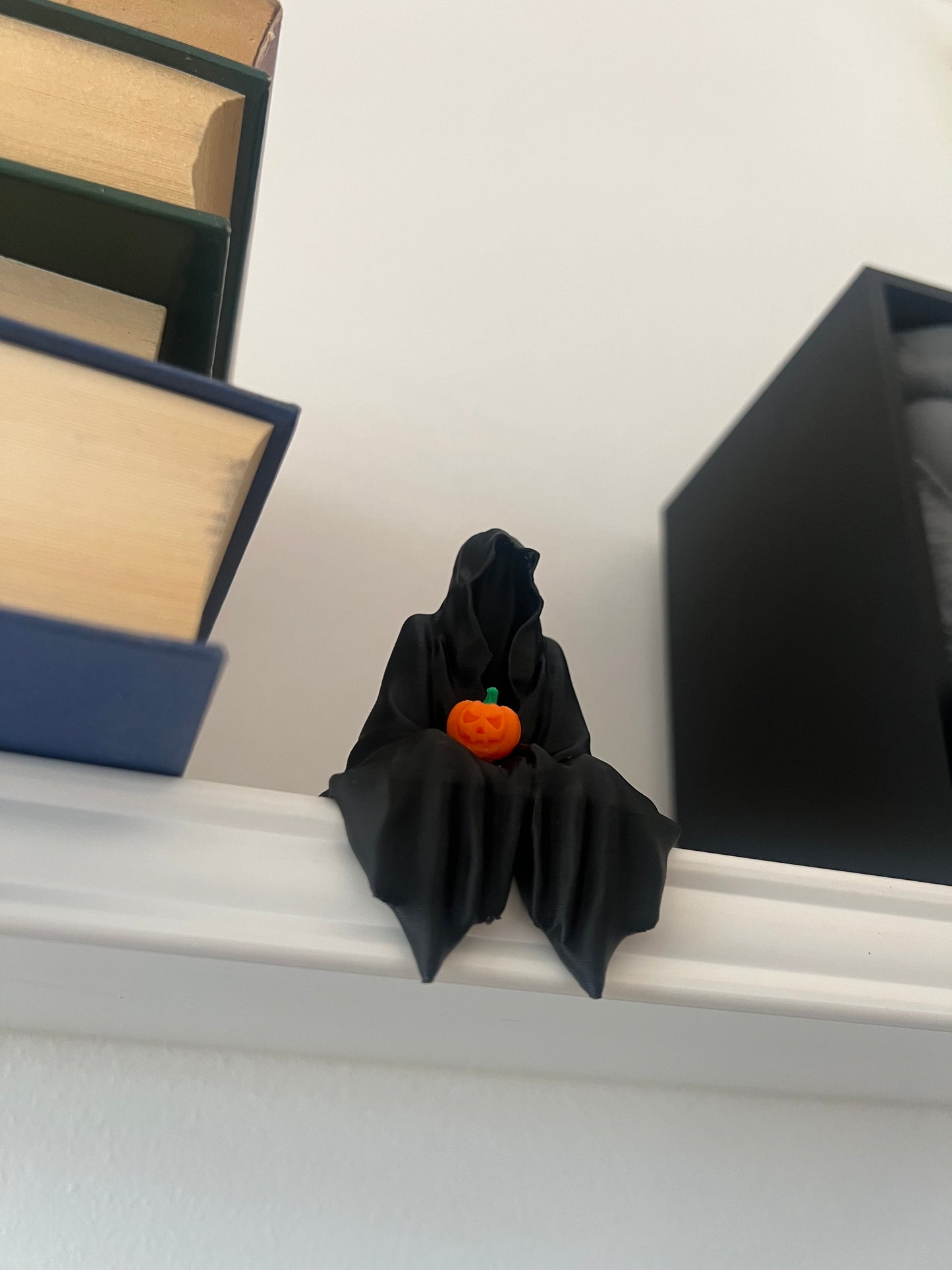 Grim Reaper Seated Figure with Tea Cup or Pumpkin for Bookshelf Decor